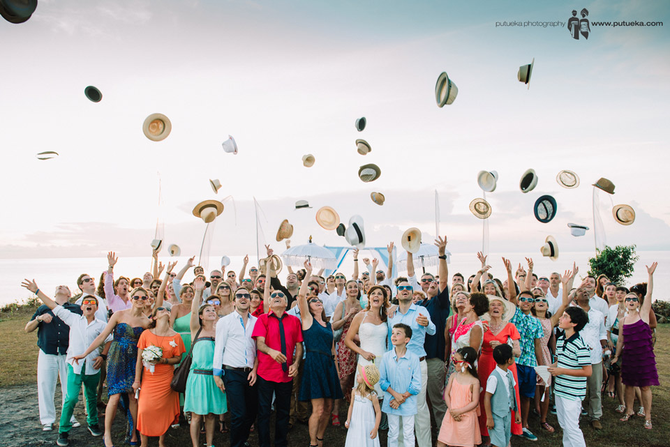 Throwing hats up in the air for Camille and Perrick wedding