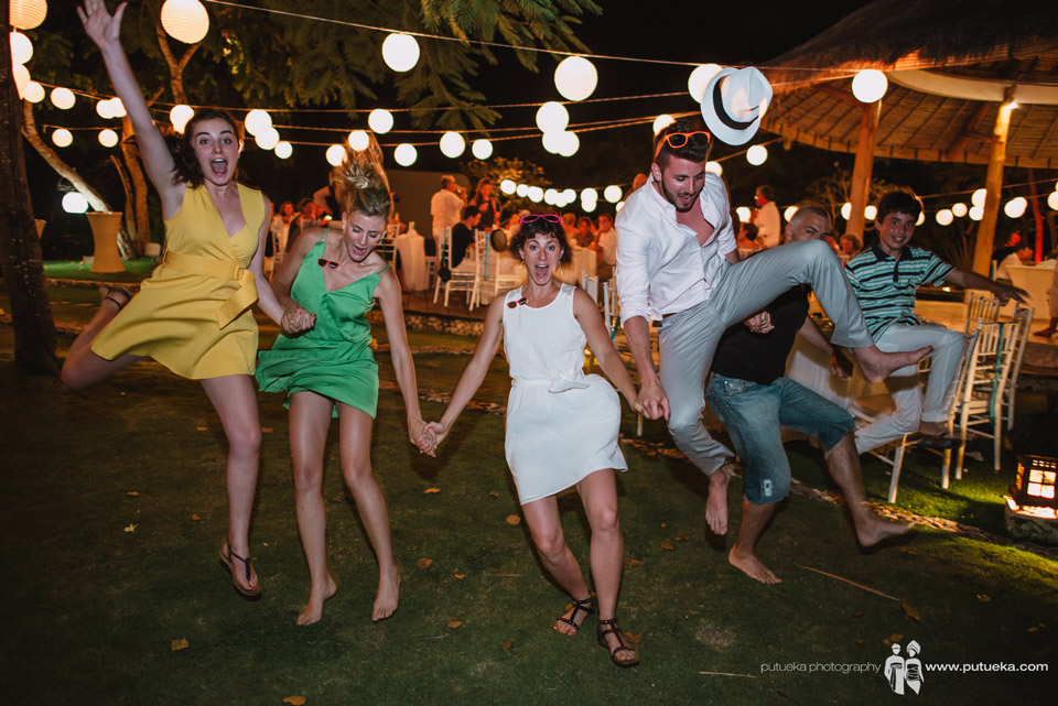 Jumping together as a sign of happiness for Camille and Perrick wedding