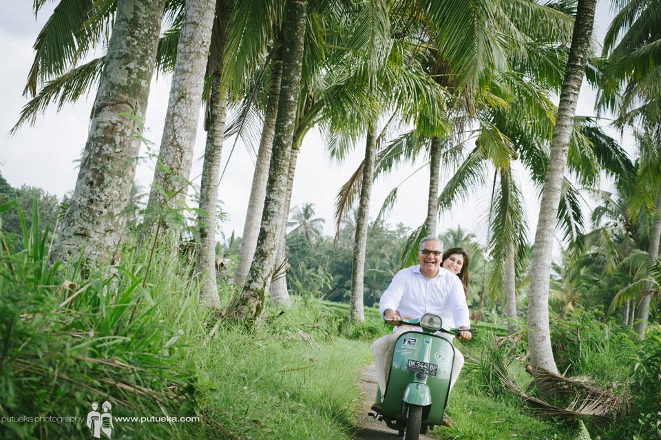 Family photography session in green lush of Ubud with green vespa