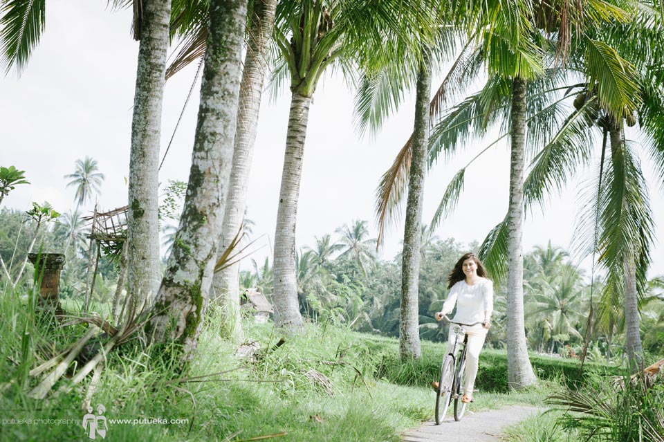 Unforgettable moment riding bicycle on family vacation photography session in Ubud Bali
