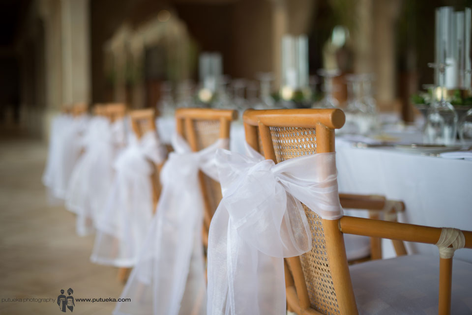 Dinner reception chair wrapped with white fabric