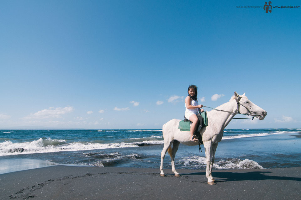 Unforgettable moment riding horse at the beach in the morning