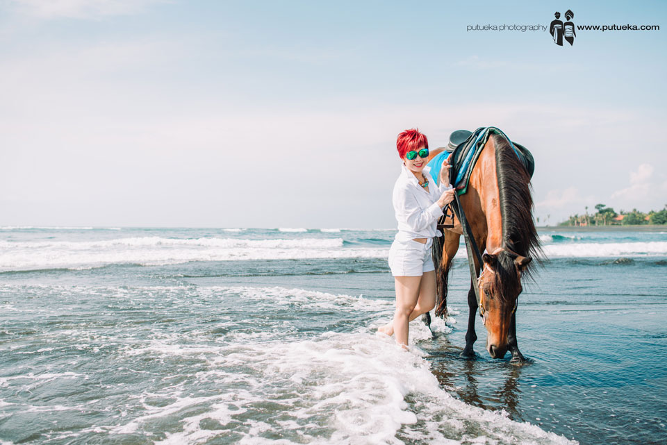 Once in a lifetime experience walking on the beach with horse