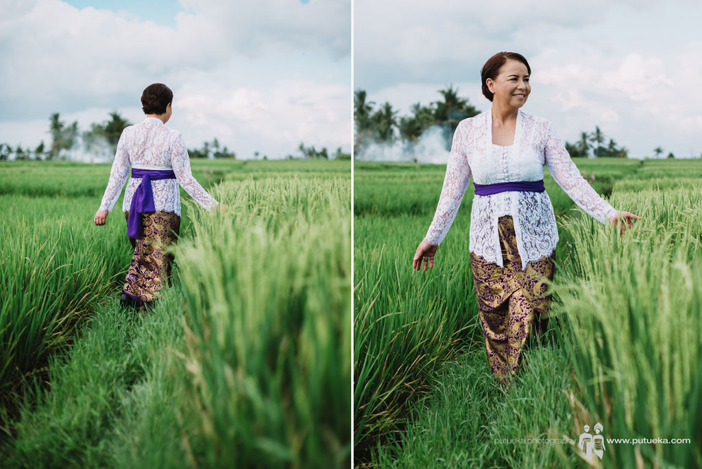 Ms Lina walking through the Tanah Lot rice fields