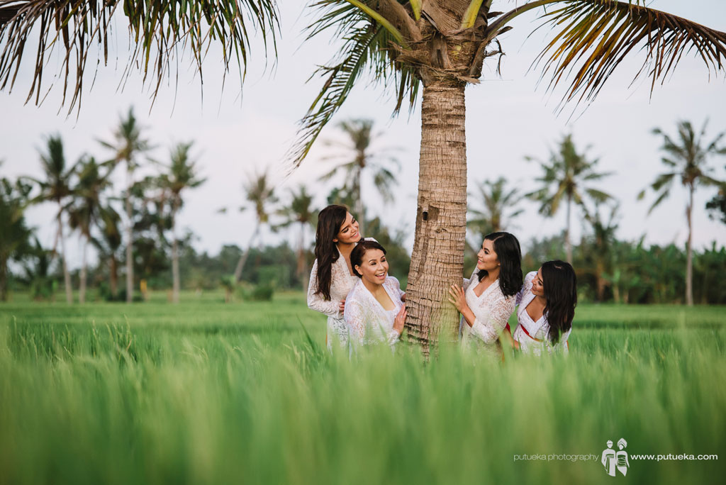 Photo session under coconut tree inside rice fields area